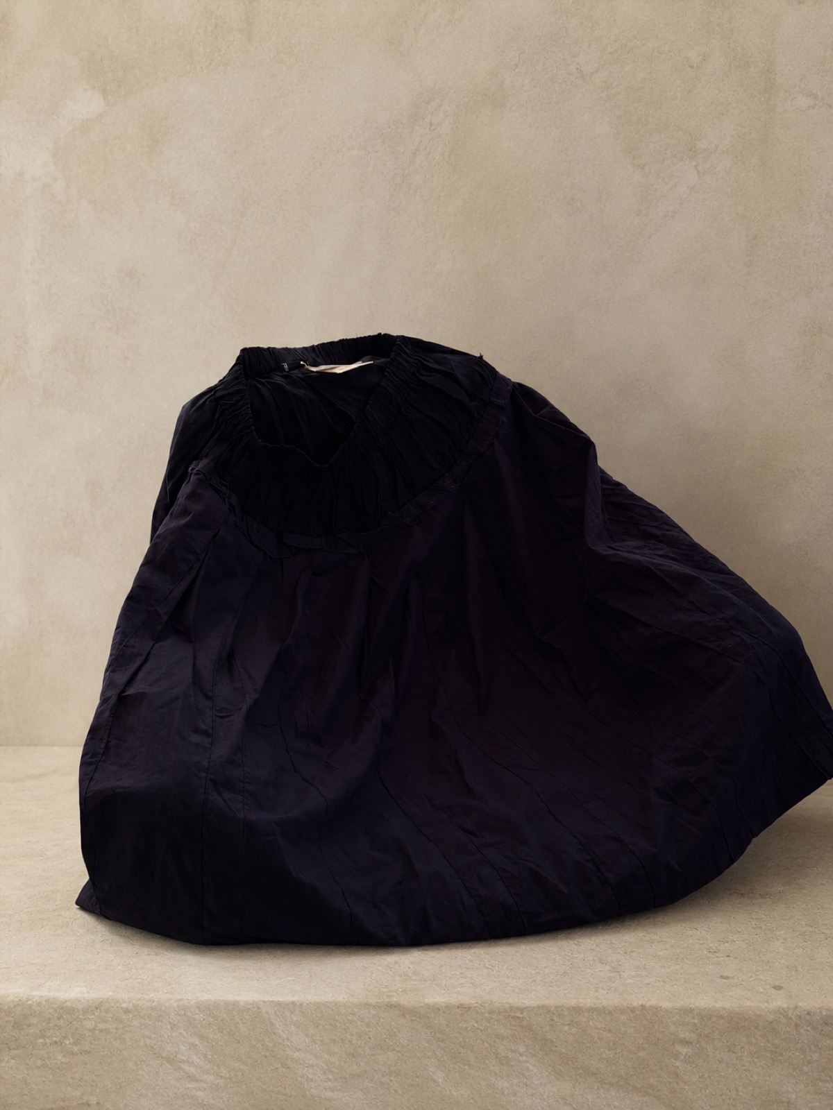 CDG navy volume skirt photographed for Wabivibe